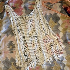 Subtle luxury lace crochet top. White floral lace crochet tank.